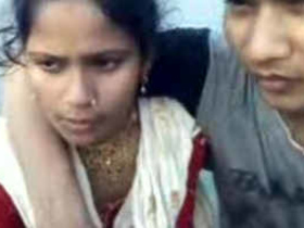 A young Indian girl receives a passionate kiss from her college-age neighbors