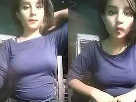 Cute Indian girl in a tight dress flaunts her assets on call