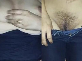 Desi girl flaunts her tits and pussy in steamy video