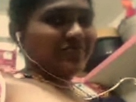 Watch a busty Desi woman show off her assets in a video chat