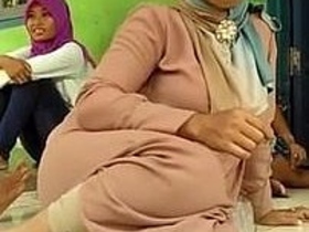 Beautiful Indonesian mother in hijab stars in erotic video