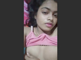 Indian girl flaunts her breasts and vagina in a seductive video