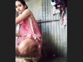 Desi wife takes a bath in the village outdoor