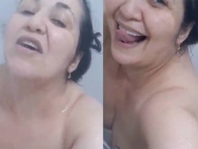 Granny has fun in the shower and makes video for lover