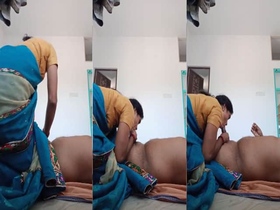 Busty maid gives a blowjob to her employer in a saree