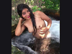 Punjabi beauty takes outdoor shower in the nude