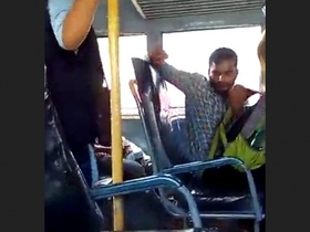 A man masturbates on a bus in front of a girl passenger who is recording him