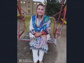 A husband records his wife undressing while watching a nude video