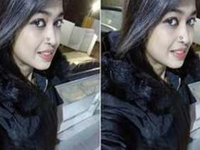 Watch a stunning Indian girl flaunt her breasts and pleasure herself in this explicit video