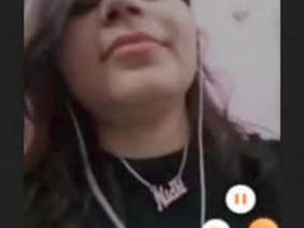 Beautiful Indian woman flaunts her breasts in a seductive manner