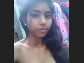 Young woman displaying her assets, featuring a desi bhabi