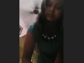 Busty Indian babe flaunts her curves in erotic video