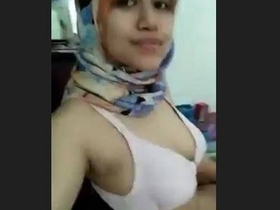 A young hijabi girl reveals her sensual side on webcam