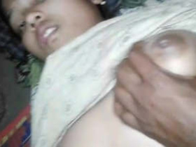 Adorable girl fondling her breasts and engages in sexual activity