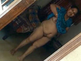 Indian aunty flaunts her big tits and pussy in a steamy video