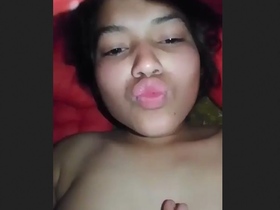 Watch a stunning Indian girl pleasure herself with her fingers in this explicit video