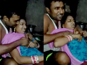Passionate Desi couple explores sensual boob caress in bedroom