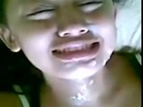Watch a young Malaysian girl in a steamy video