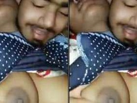 Indian man records himself and his girlfriend kissing and fondling her breasts