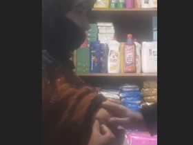 Desi MILF fondles shopkeeper's breasts in public