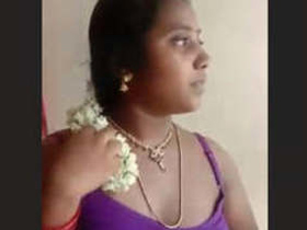 Mallu bhabhi gives a boob-sucking and fucking show in this video