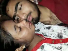 Indian sweethearts intimate in restaurant