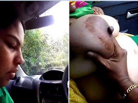 Exclusive video of a Tamil wife giving a blowjob and getting her big boobs hugged