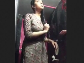 Indian wife with large breasts takes nude bath