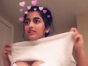 NRI teenage girl strips and shows off her body in a sexy video