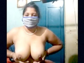 Tamil wife flaunts her big boobs in front of camera