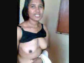 An Indian beauty flaunts her large breasts as she reveals them