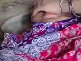 Desi aunty's big tits revealed during steamy sex session