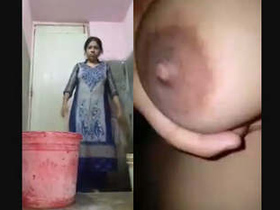 Bhabhi's solo bath in the tub with her perky boobs on display