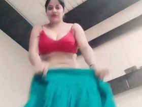 Gorgeous brunette babe flaunts her curves in a solo performance