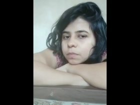 A Punjabi girl with large breasts displays her body