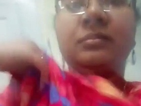 Tamil school teacher flaunts her big boobs in a sexy video