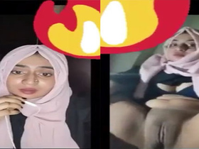 College girl in hijab masturbates with fingers