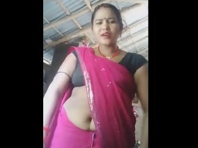 Bhabi with a big belly in shorts gets naughty in video 7