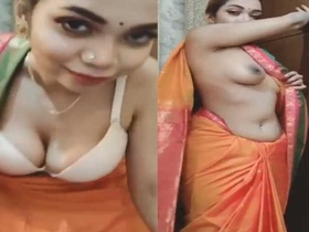 Saree-clad bhabi strips down to tease in front of camera