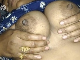 Indian wife's breasts fondled by spouse