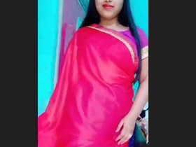 Stunning Indian beauty dances sensually on camera, revealing her alluring curves