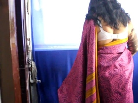 Indian aunt showers in traditional saree