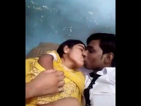 Indian couple passionately kissing with breasts in close contact