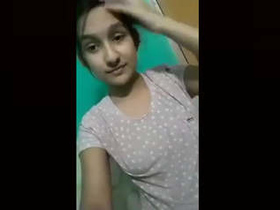 Adorable Desi girl reveals and stimulates herself in a fresh video
