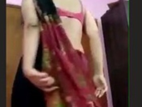 Adorable young woman in a sari - A hot video