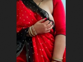 MILF with a bong teases in a sari and fondles her breasts