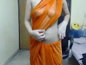 Indian woman wears sheer saree