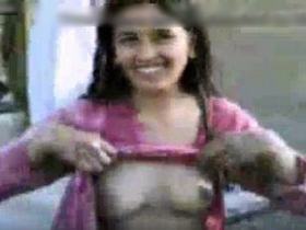 Pakistani girlfriend with boyfriend in rural setting