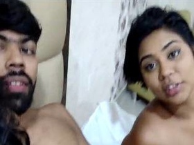 Two women pleasure a man in a threesome with oral sex and handjobs