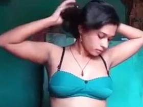 Watch a naughty Indian girl strip and masturbate in this erotic video